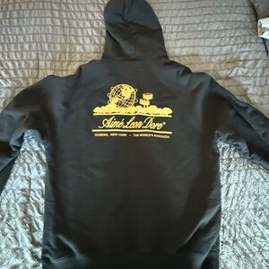 Aime Leon Dore Black Hoodie with Yellow Graphic